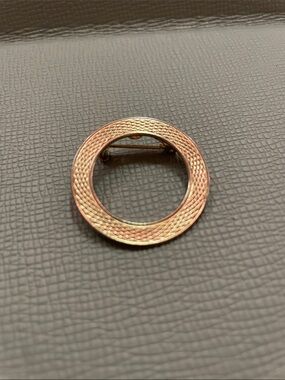 Vintage gold tone brooch